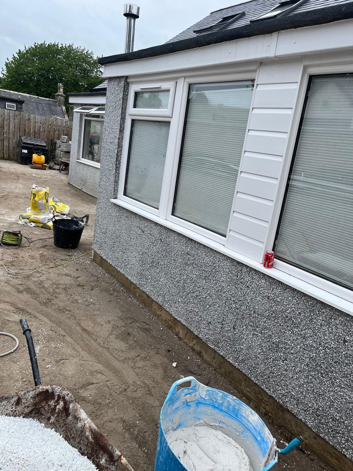 Dormer and chimney stack repairs on a slate roof